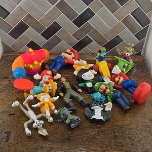 Misc Toys bundle. Include 16 figures toys. Sold as see